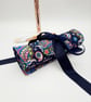 Navy blue make up wrap with colourful pattern.  - Image 6