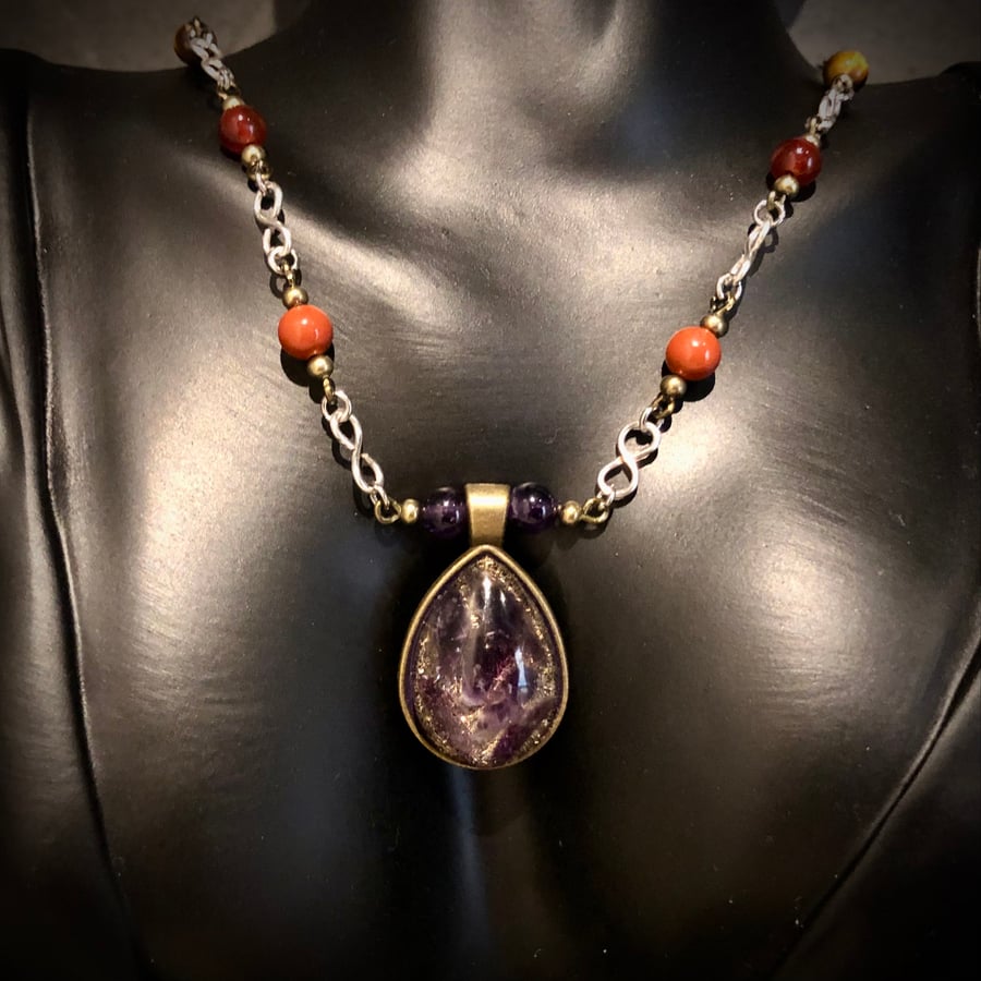 Chakra Pendant with Amethyst Quartz Tear Drop featuring infinity symbols