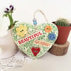 Ceramic heart decoration with button flowers Beautiful garden 