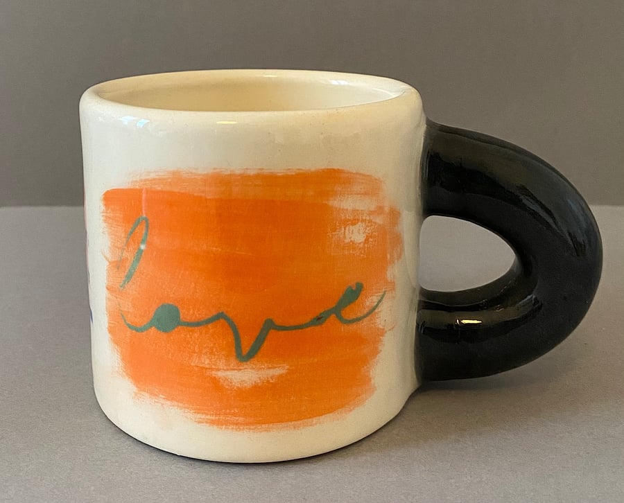Love, Love, Love ceramic cup.