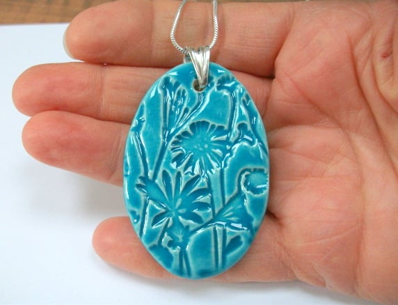 SALE Large ceramic oval pendant imprinted with a floral design - sterling silver