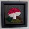 Red mushroom and leaves hand appliqued textile art