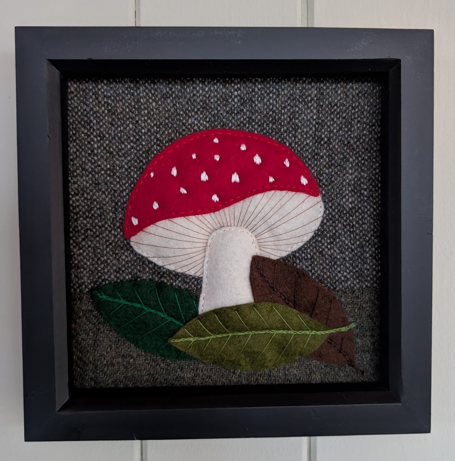 Red mushroom and leaves hand appliqued textile art