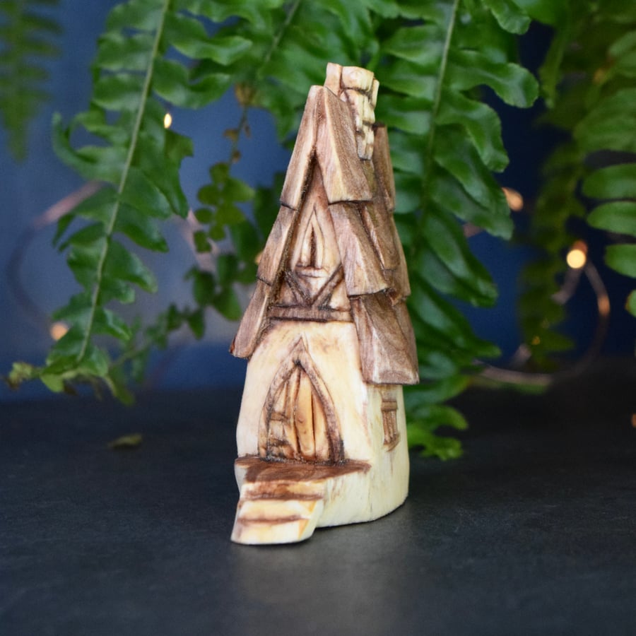 Fairy house hand carved from silver birch