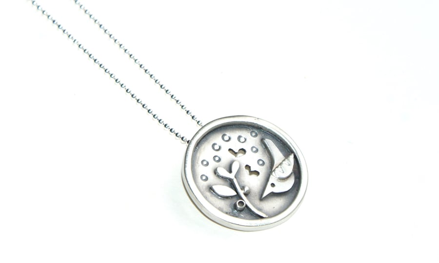 Bird and seedling silver pendant 