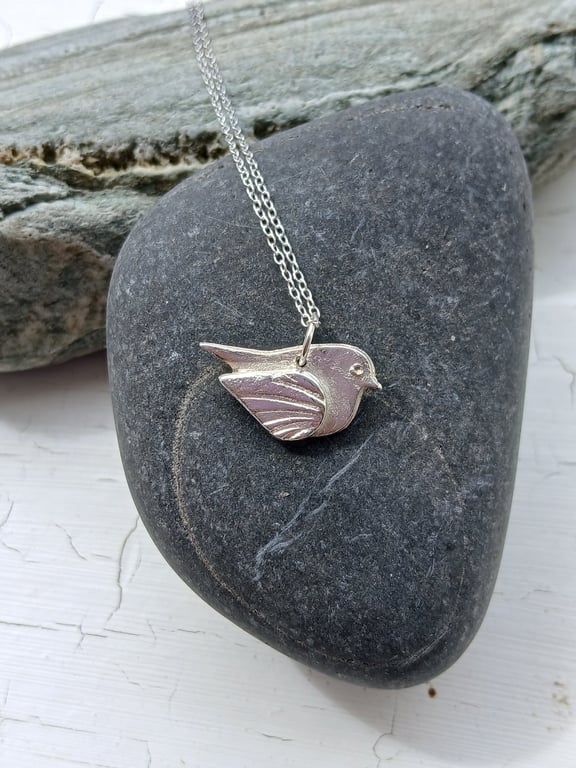 Silver bird pendant made from silver clay