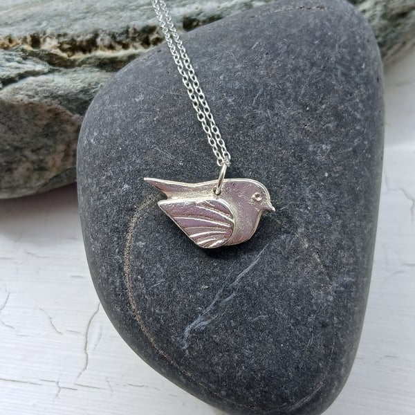 Silver bird pendant made from silver clay