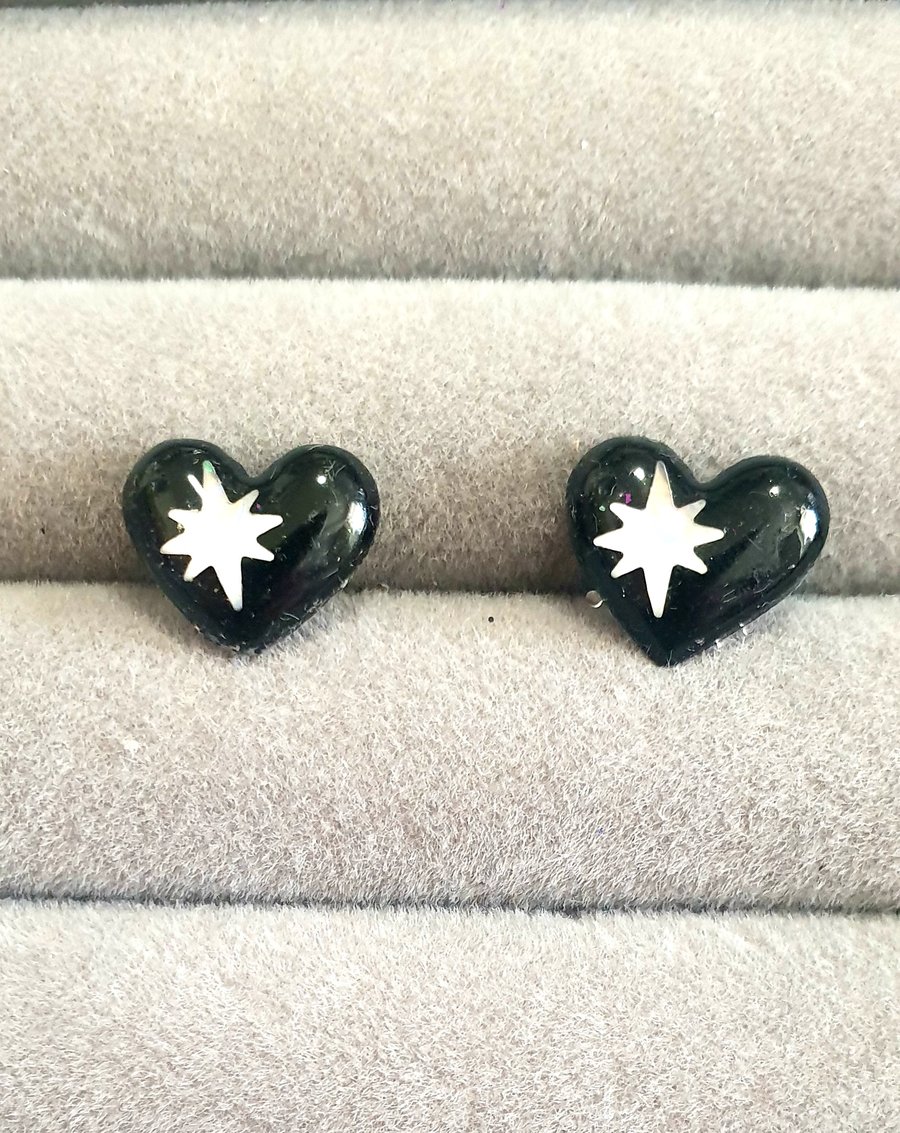 Black star stud earrings