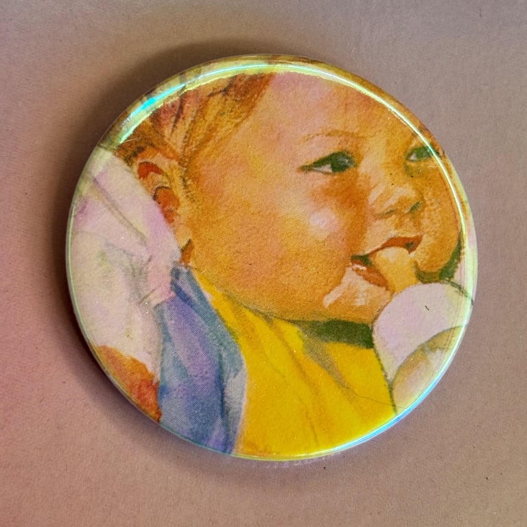 Holographic vintage book pin badge - ladybird baby with bottle
