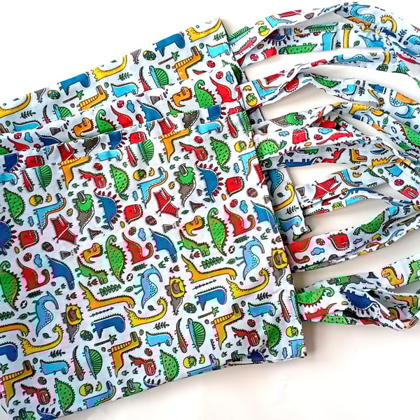 DINOSAURS theme, 4 Pack, multicoloured, fun, party, present or book bags