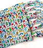 DINOSAURS theme, 4 Pack, multicoloured, fun, party, present or book bags - Image 1
