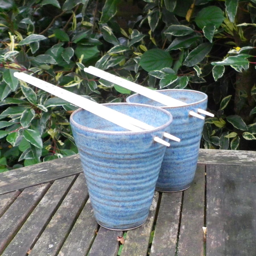 A pair of noodle or rice bowls in stoneware pottery ceramic