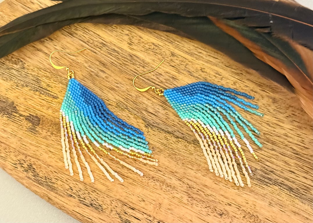 Beadwork fringe earrings in ocean blue and golden sand tones