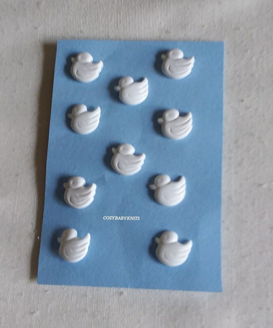 WHITE DUCK BUTTONS WITH A SHANK ON THE BACK FOR ATTACHING