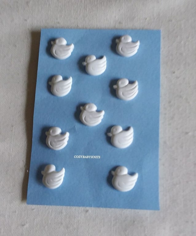 WHITE DUCK BUTTONS WITH A SHANK ON THE BACK FOR ATTACHING
