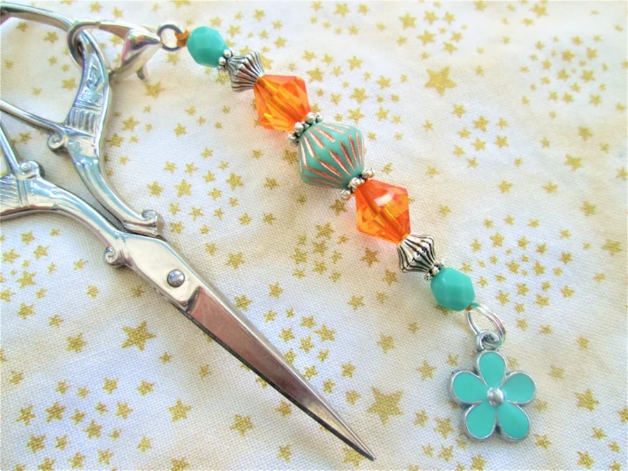 Teal and orange scissor fob with flower charm, floral bag charm or zipper pull