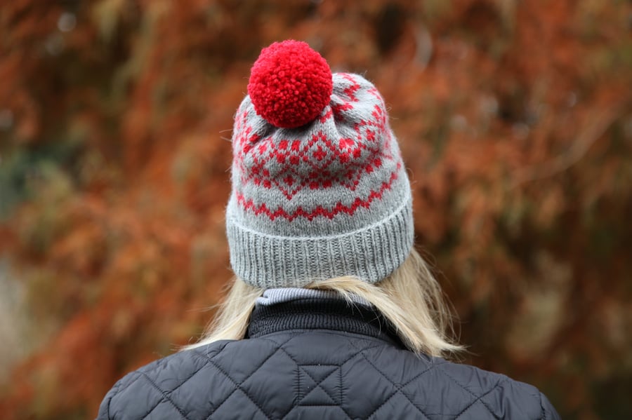 Hand knit wool bobble hat. Grey winter fairisle pompom beanie hat. 