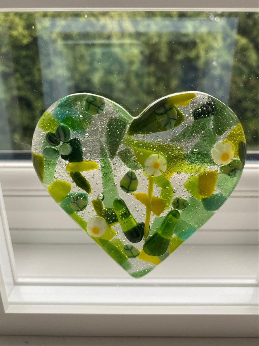 Framed green glass cast heart 