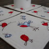 embroidered bird coasters - set of 4 - blue