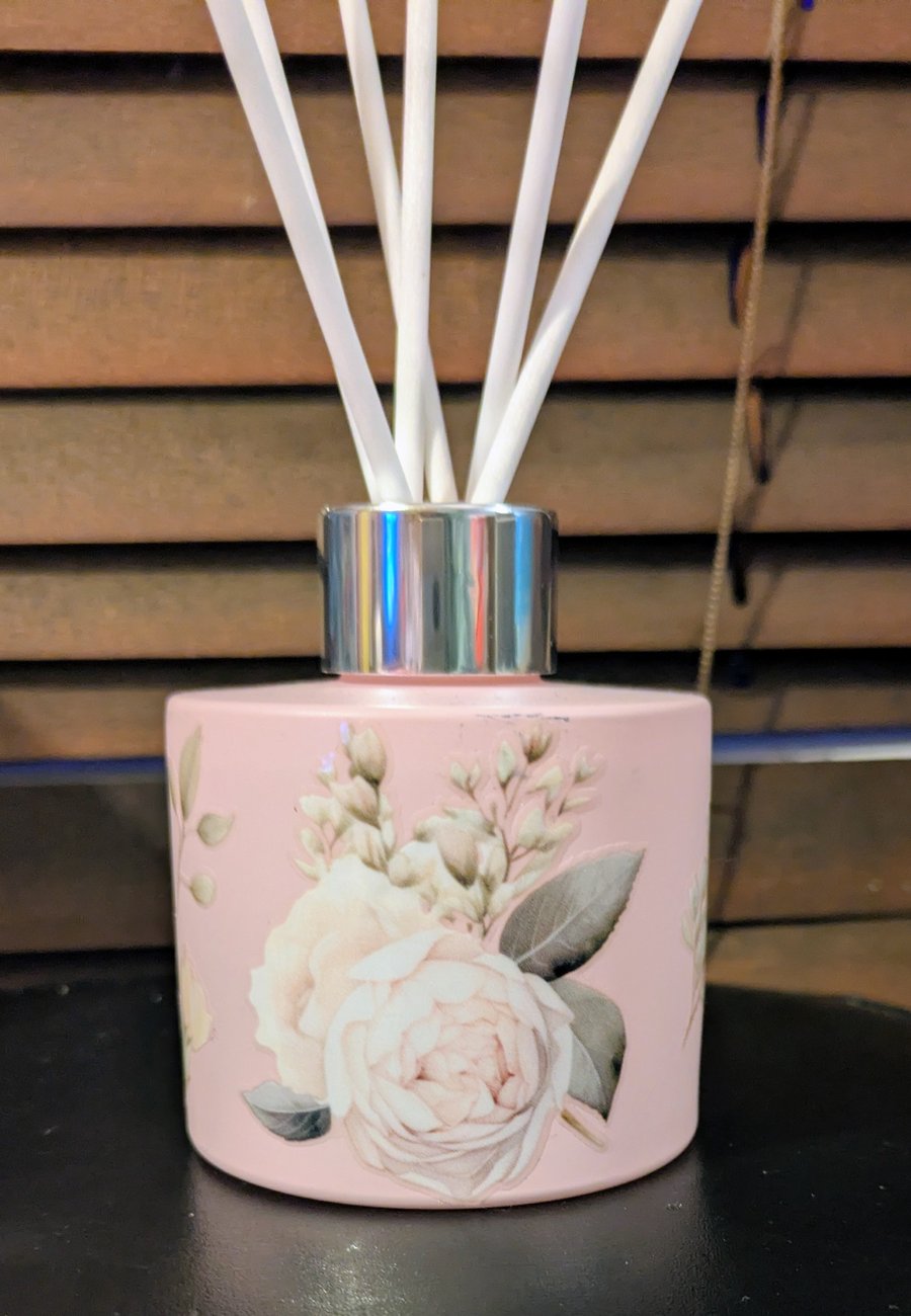 Pink glass floral themed diffuser bottle 150 ml with white reed sticks 