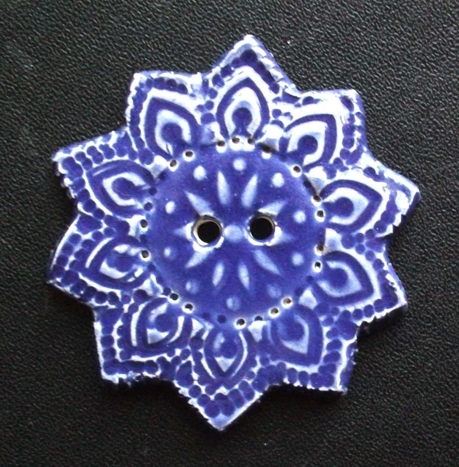 Large purple ceramic feature button