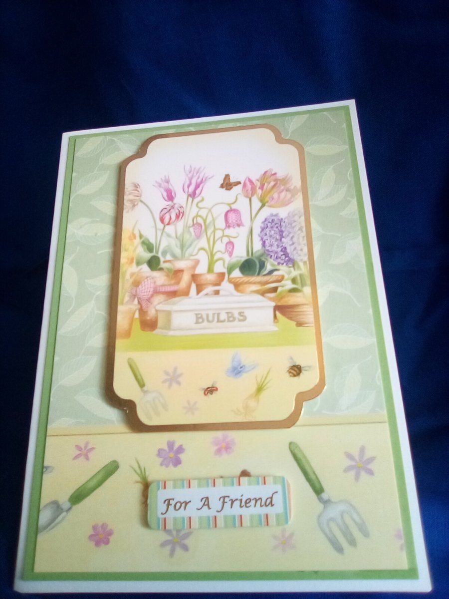 A gardening themed open blank card featuring Tulips
