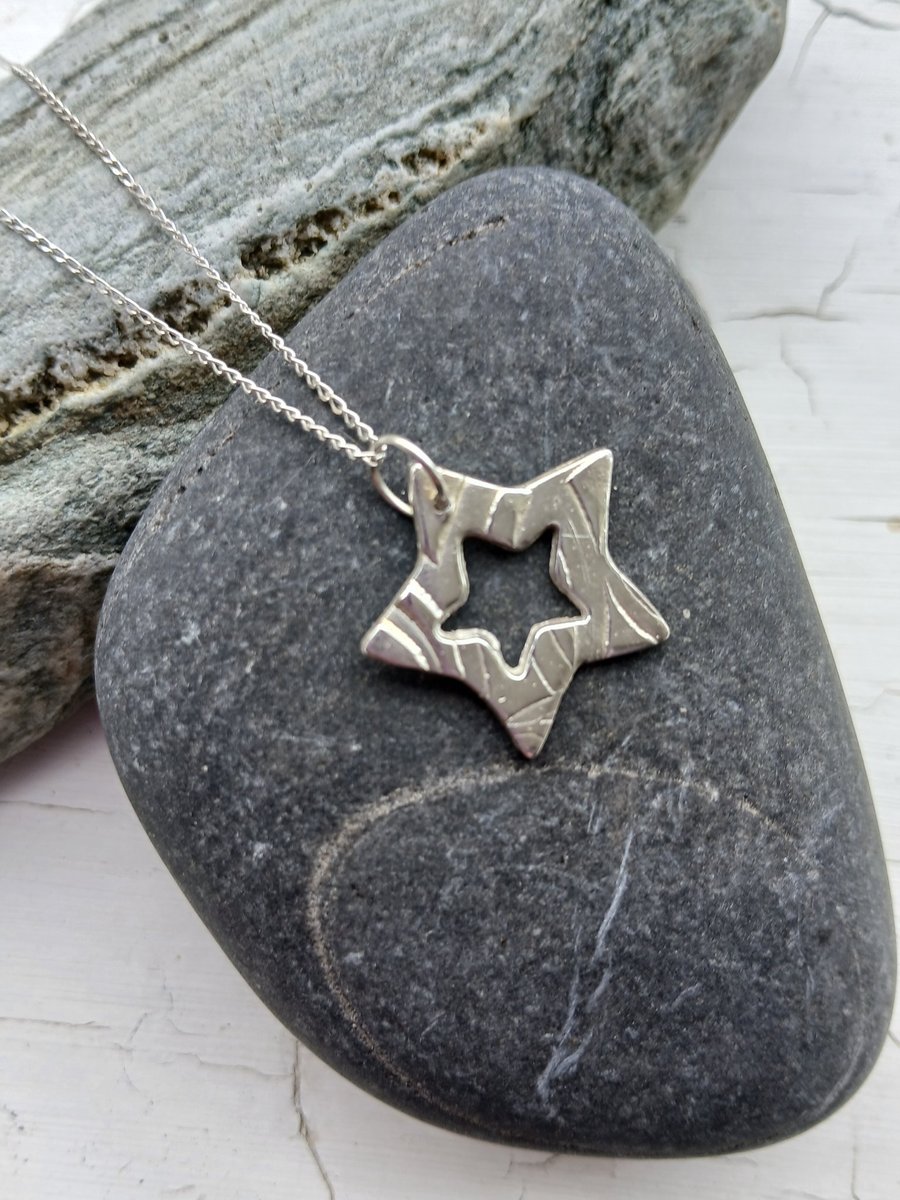 Silver star pendant made from silver clay