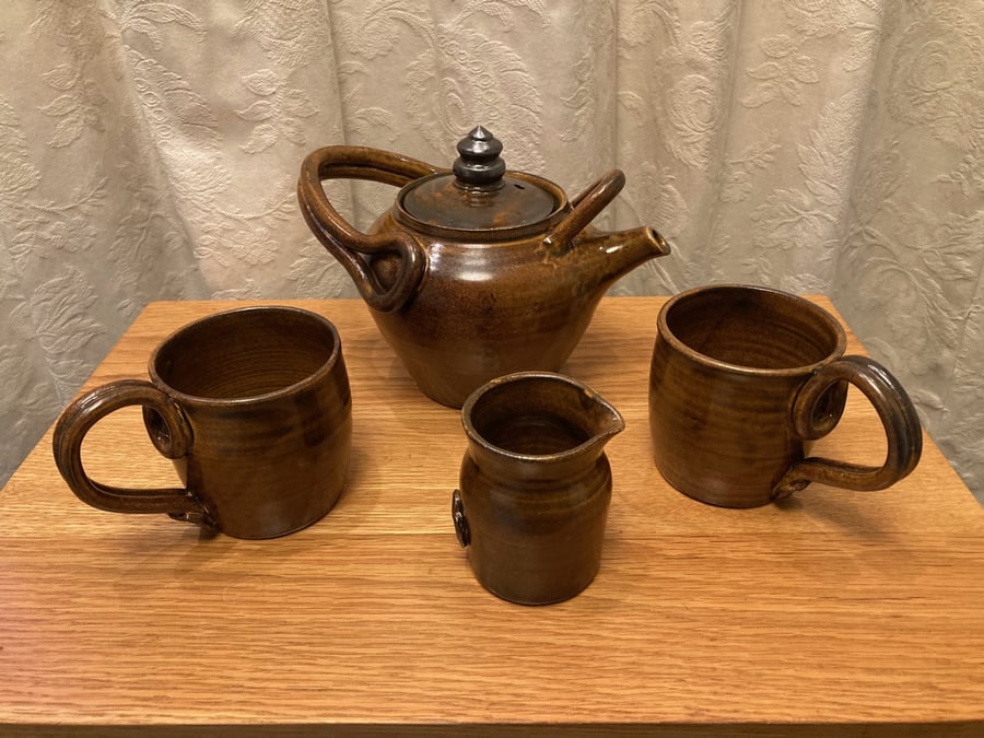 Tea for two!  Teapot, 2 mugs and pourer