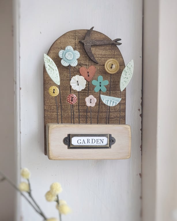 Flower Garden with Bird in Wood and Clay