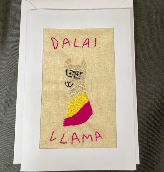 Dalai llama hand embroidered card.