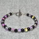 Pink Shimmer Frosted Glass and Faceted Black Glass Bead Bracelet