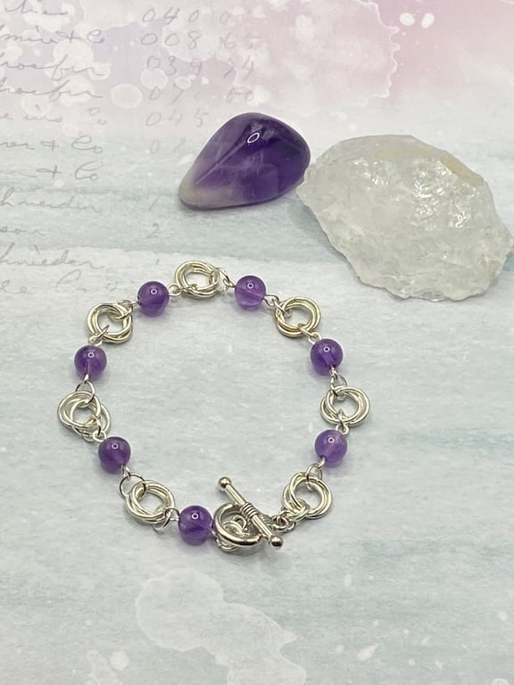 Amethyst bracelet with silver plated mobius rings 