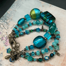 Beautiful lamp work glass beaded three stranded bohemian artisan bracelet  