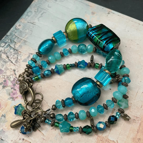 Beautiful lamp work glass beaded three stranded bohemian artisan bracelet  