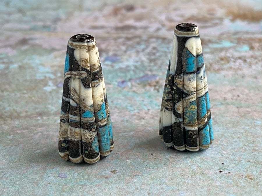 Turquoise, Black and Ivory Pleated Cones.