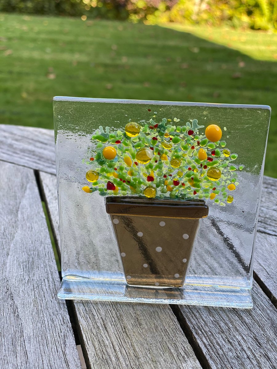 Yellow flowers in pot ornament