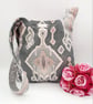 Reversible grey and patterned knot bag.  - Image 4