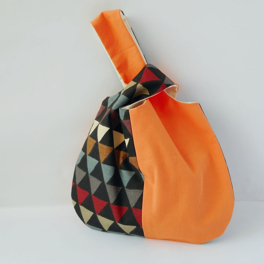 Cotton japanese Knot bag in orange and black