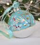 Winter wildflower ceramic Christmas bauble - Image 1