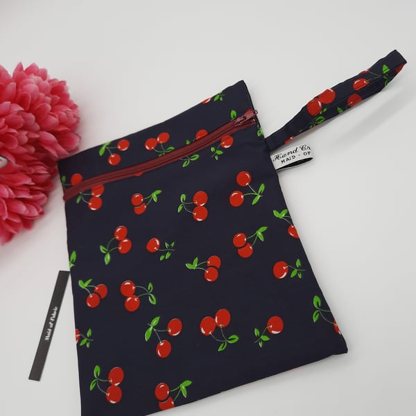 Zipped pouch,  clutch bag,  navy cherry fabric,  free uk delivery.  