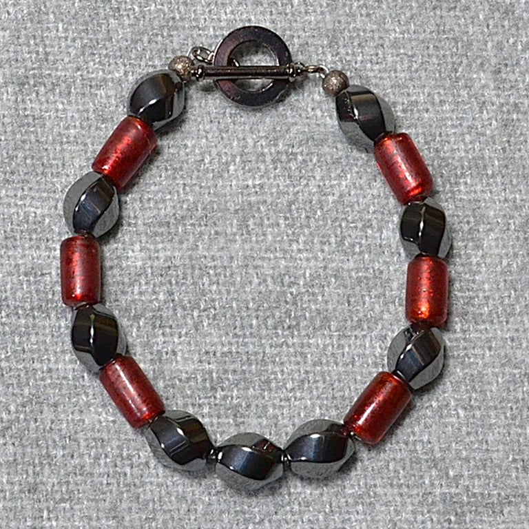 Hematite Swirl and Frosted Red Glass Tube Bead Bracelet