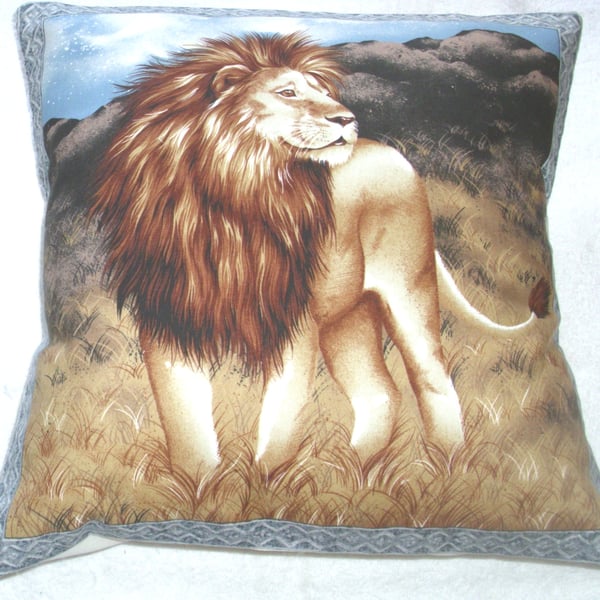 On Safari Magnificent Lion standing on the dry grassy plain cushion