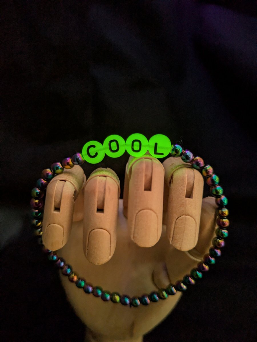 Glow in the dark letter bead bracelet 'COOL' with Hamatite crystals