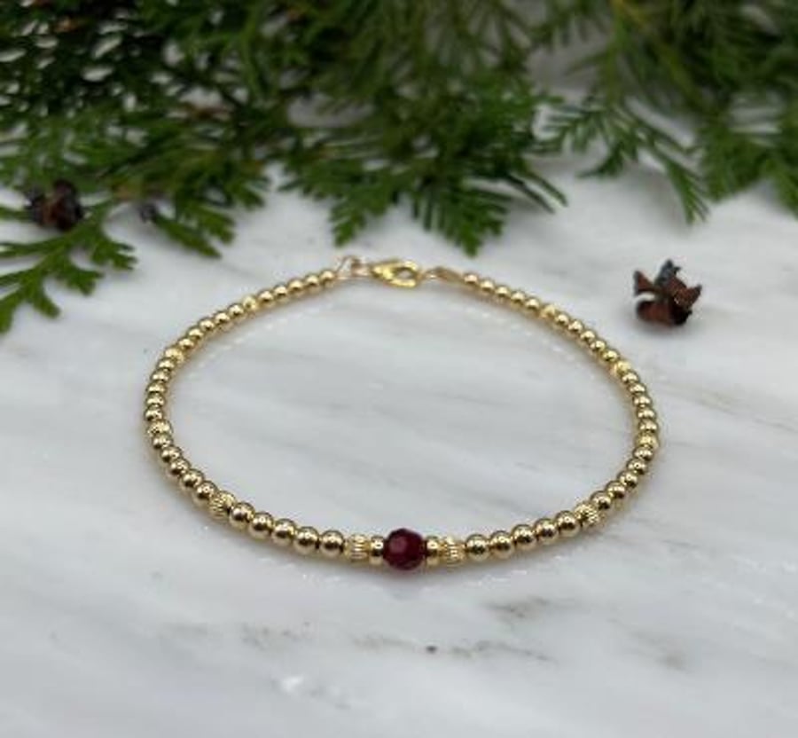 Garnet solitaire bracelet