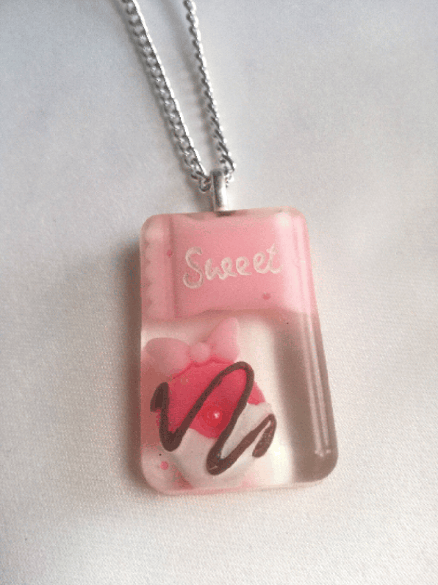Handmade resin necklace with cute candy and donut charms in pink on silver chain