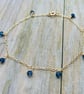 9ct gold bracelet with small faceted sapphire charms - Image 1