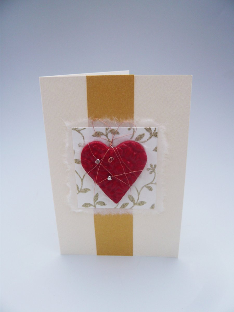 Handmade Valentine's Card. Large textured heart with silver hearts.