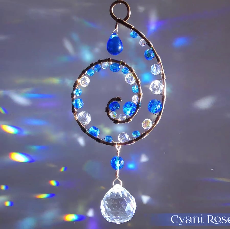 Pretty Spiral suncatcher Blue and copper with sparkly prism