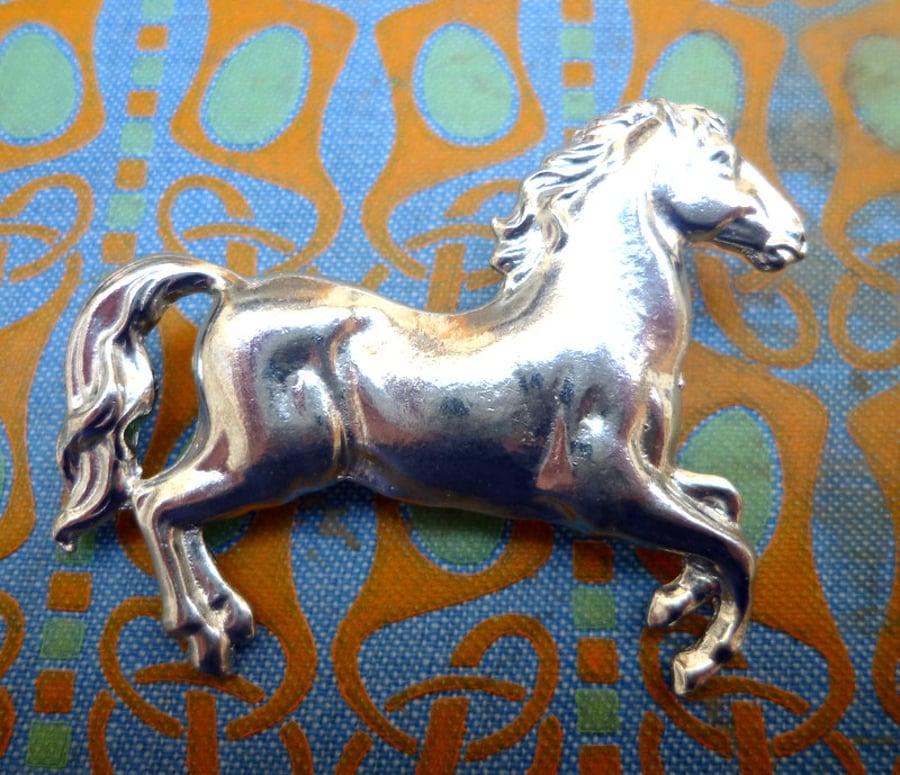 Silver horse brooch