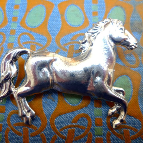 Silver horse brooch